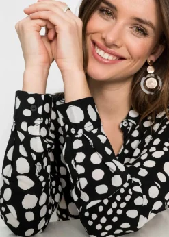 bonprix Blusen & Tuniken|Nachhaltigere Materialien^Bedruckte Longbluse aus nachhaltiger Viskose schwarz/wollweiß gepunktet