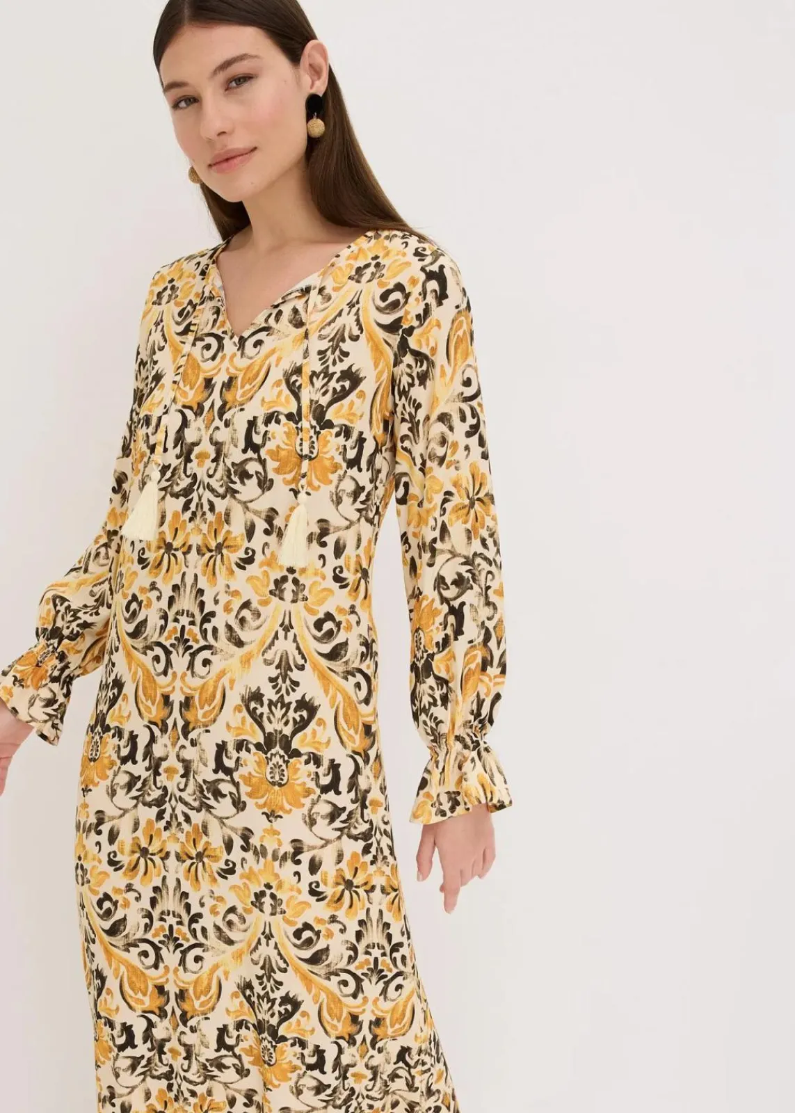 bonprix Nachhaltigere Materialien|Kleider^bedrucktes Kaftan-Kleid aus fließender Viskose wollweiß/ocker bedruckt