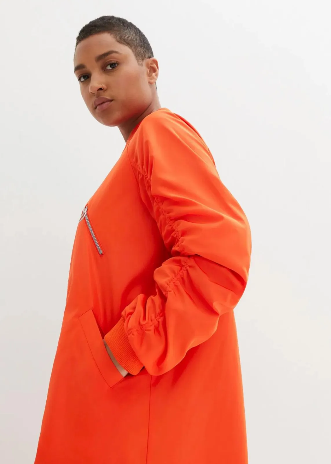 bonprix Nachhaltigere Materialien|Jacken & Mäntel^Blouson-Mantel mit Strickkragen tieforange