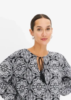 bonprix Blusen & Tuniken|Nachhaltigere Materialien^Blusenshirt aus strukturierter Viskose schwarz/weiß bedruckt