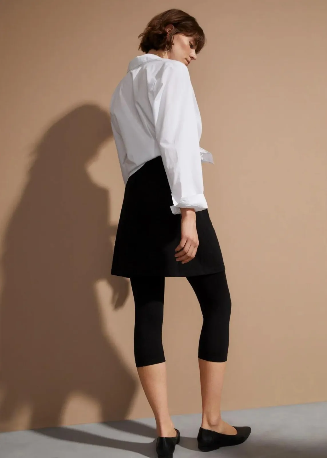 bonprix Bekleidung·Kleider|Nachhaltigere Materialien^Capri-Leggings mit Rock aus elastischem Baumwoll-Mix schwarz