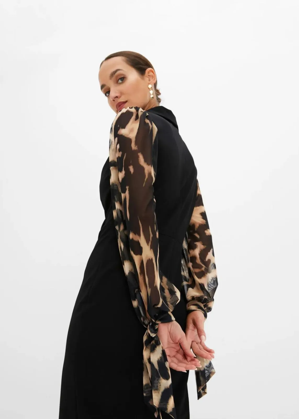 bonprix Kleider^Etuikleid mit tiefem Ausschnitt schwarz/beige leo bedruckt