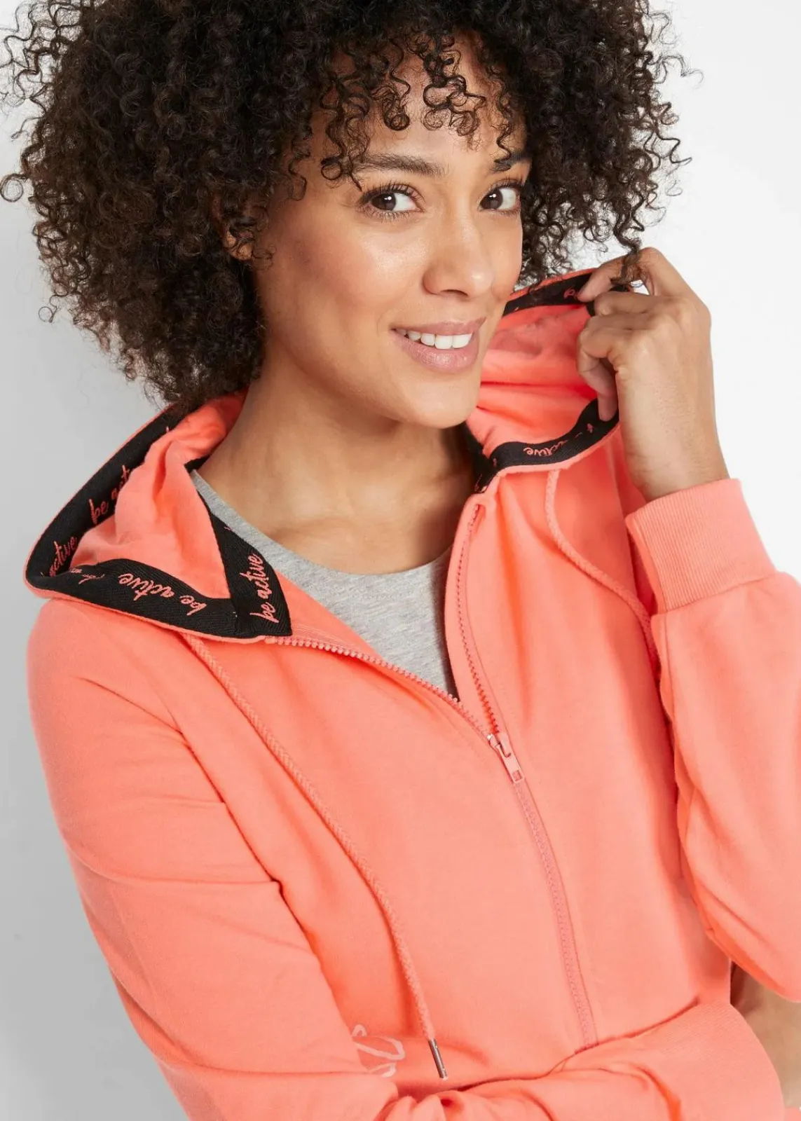 bonprix Sweat|Bekleidung·Blusen & Tuniken^Kapuzen-Sweatjacke aus reiner Baumwolle lachs bedruckt