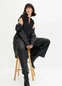 bonprix Nachhaltigere Materialien|Shirts & Tops^Kurzarmshirt mit Henley-Ausschnitt aus Viskosemix schwarz/weiß gepunktet
