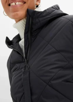 bonprix Bekleidung·Hosen|Nachhaltigere Materialien^Langer, wattierter Steppmantel mit Kapuze schwarz