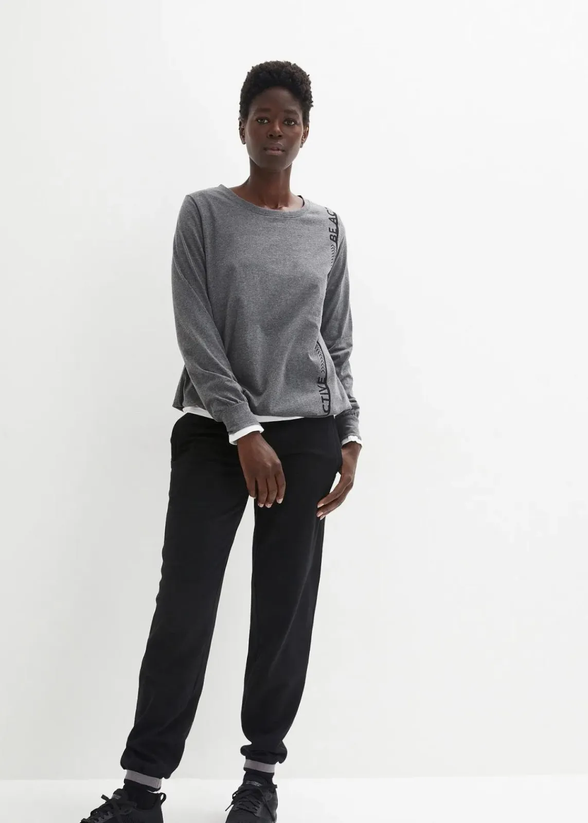 bonprix Shirts & Tops|Nachhaltigere Materialien^Lockeres Sport-Shirt grau meliert bedruckt