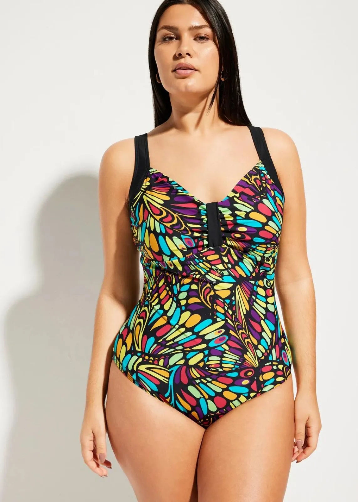 bonprix Nachhaltigere Materialien|Shapewear^Medium Shape-Badeanzug rundum bedruckt schwarz graphisch