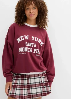 bonprix Sweat|Nachhaltigere Materialien^Oversize-Sweatshirt ahornrot/weiß bedruckt