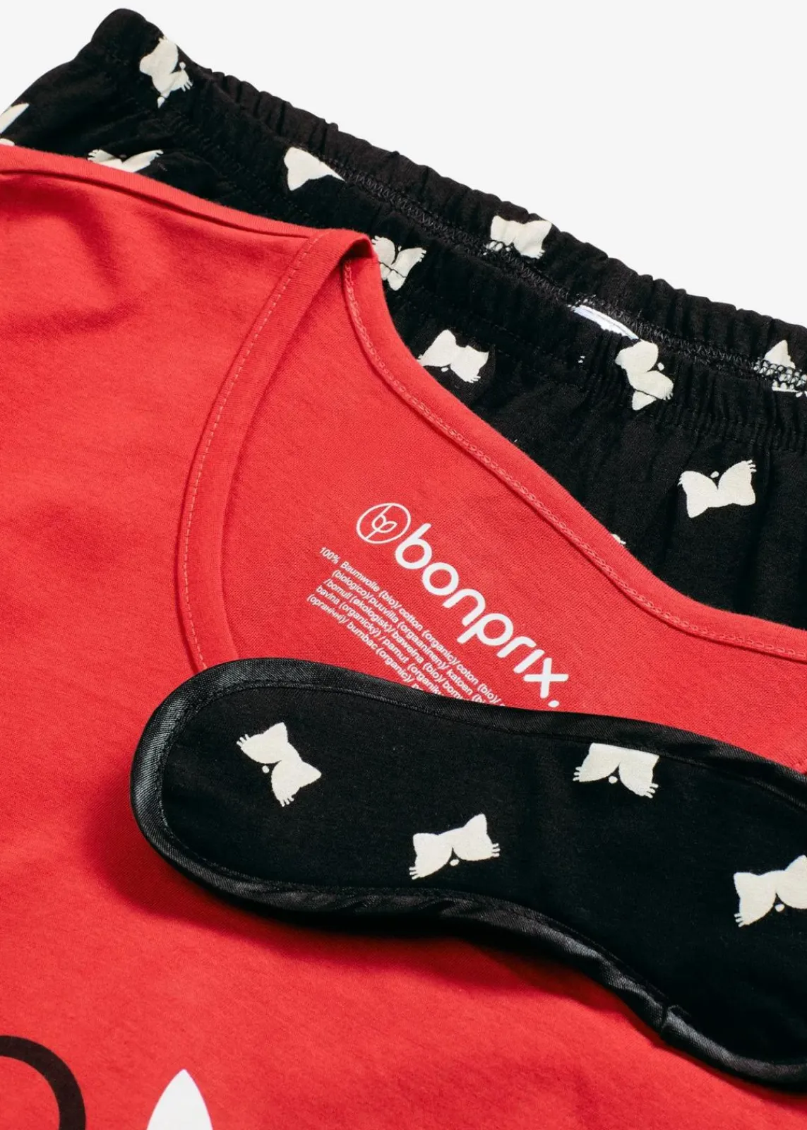 bonprix Wäsche·Nachtwäsche|Nachhaltigere Materialien^Pyjama mit Schlafmaske salsarot/schwarz bedruckt