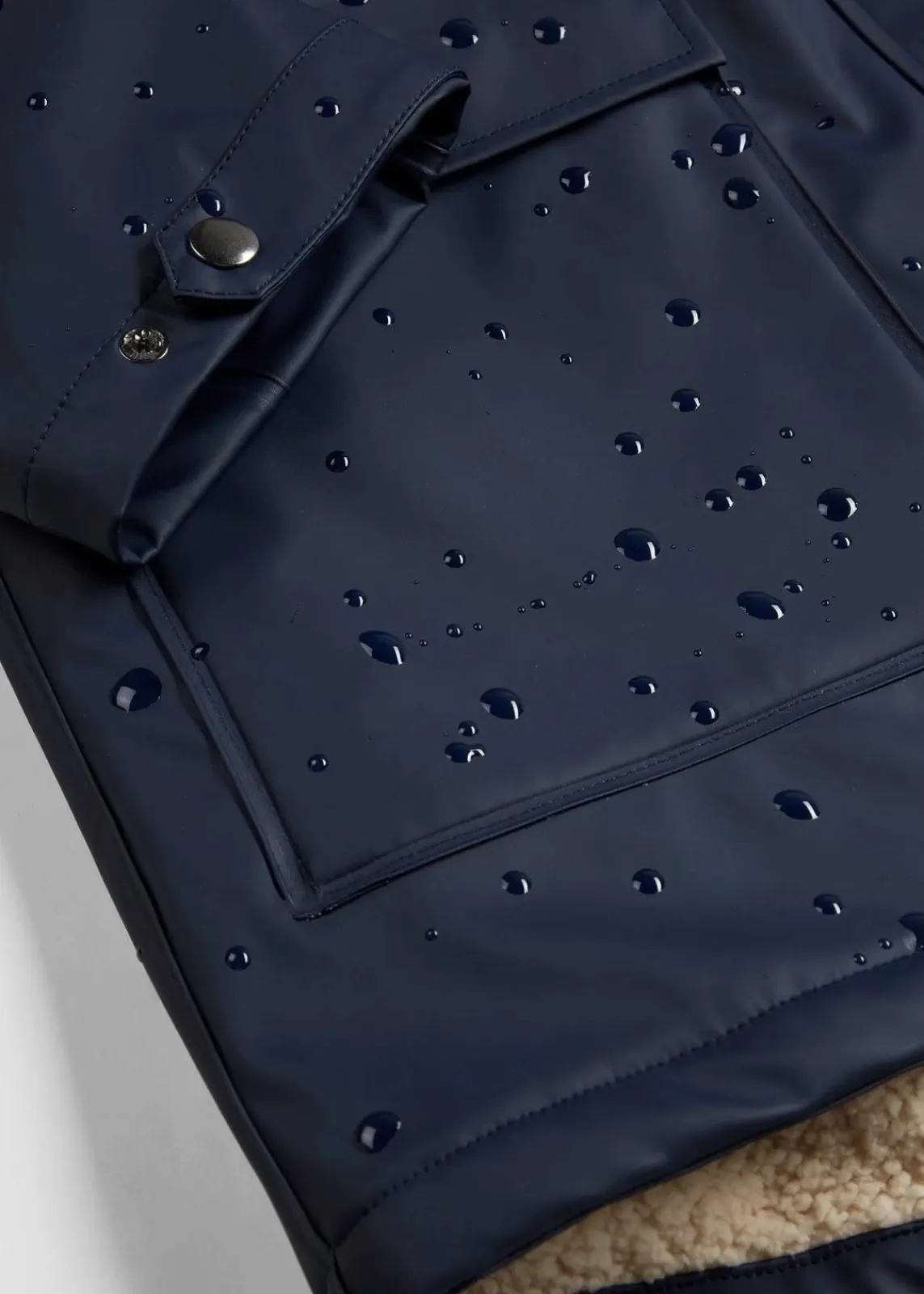 bonprix Jacken & Mäntel|Bekleidung·Hosen^Regenjacke mit Teddyfutter dunkelblau