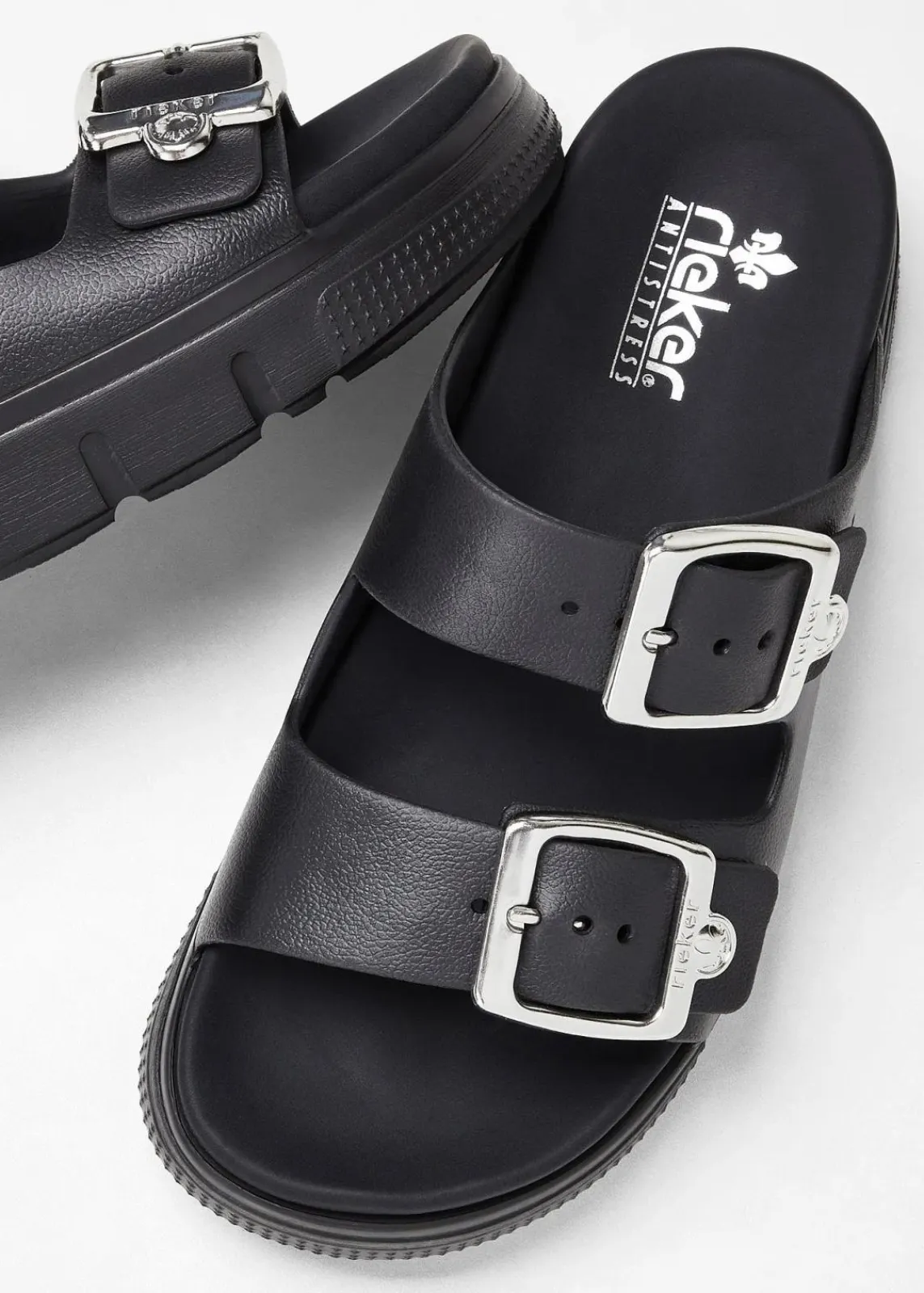Rieker High Heels|Komfortschuhe^Komfort-Plateau-Pantoletten mit leichter Sohle schwarz