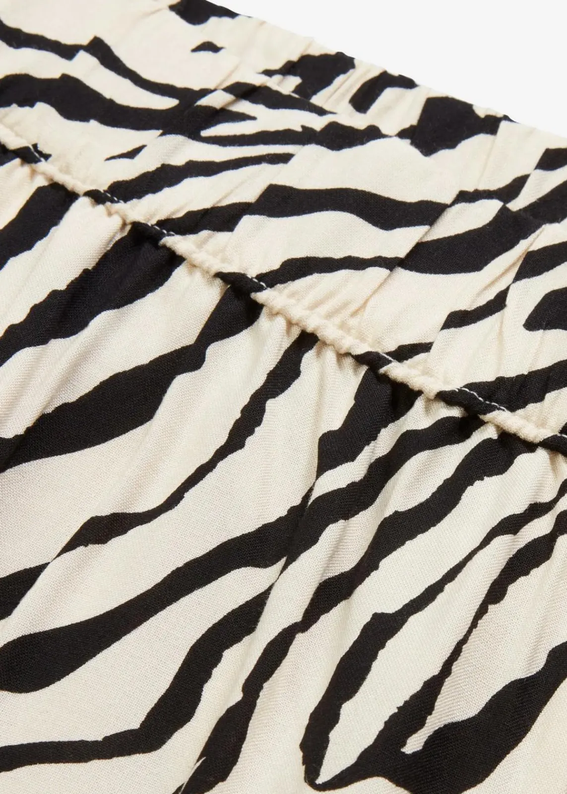 bonprix Bekleidung·Kleider|Hosen^Schlupfhose natur/schwarz zebra bedruckt