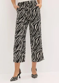 bonprix Nachhaltigere Materialien|Hosen^Schlupfhose schwarz/natur zebra bedruckt