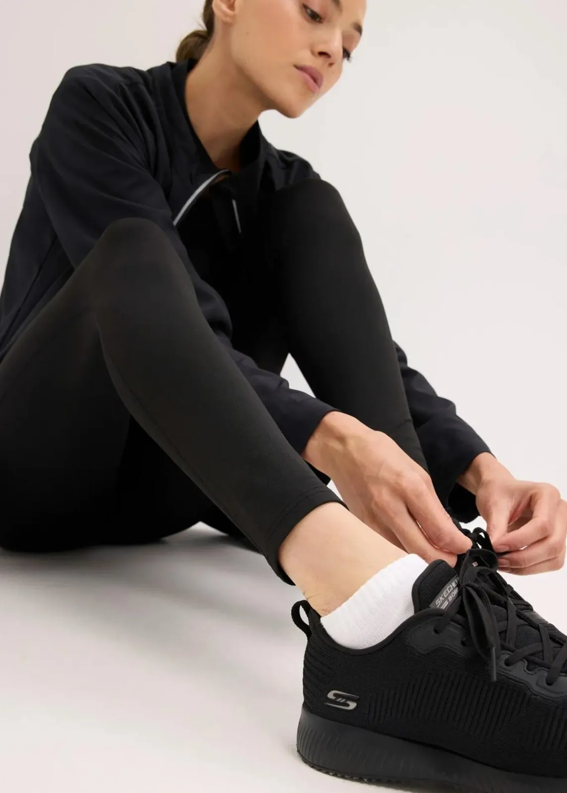 bonprix Hosen|Sportbekleidung^Thermo-Leggings mit reflektierenden Details und Handytasche schwarz