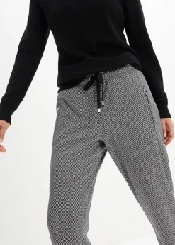 bonprix Hosen|Thermobekleidung^Thermo-Schlupfhose mit Bequembund wollweiß/schwarz graphisch bedruckt