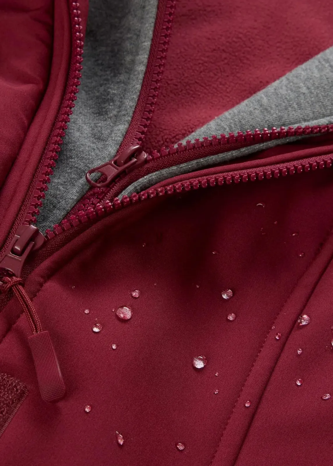 bonprix Jacken & Mäntel|Bekleidung·Hosen^wasserabweisende Softshell-Longjacke, 2 in 1-Optik bordeaux